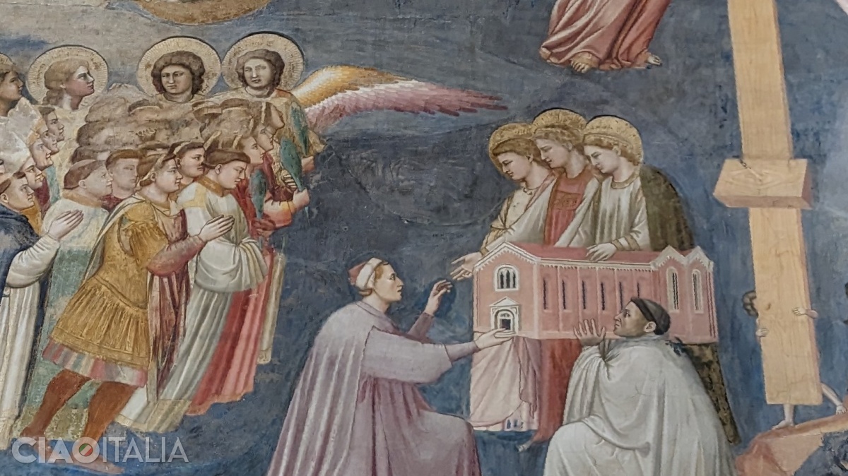 Enrico Scrovegni &icirc;i oferă Fecioarei Maria macheta capelei.