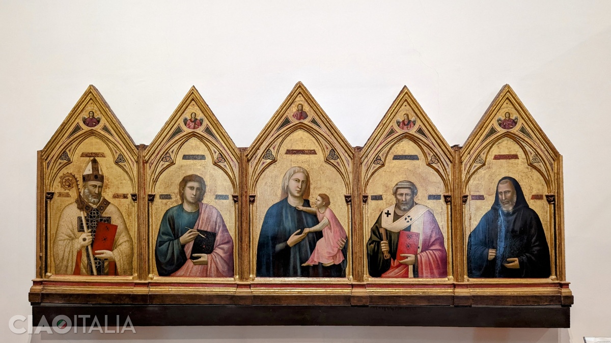 Giotto - Fecioara cu Iisus și sfinți (1295-1300), parte din altarul poliptic din Badia. Giotto este pictorul care a influențat întreaga artă a Europei de Vest.