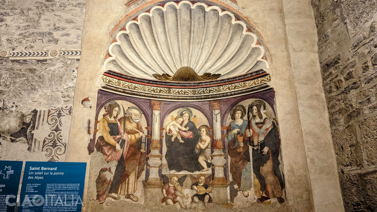 Fresca altarului din Capela Santa Lucia (1526): Fecioara cu Pruncul între Sf. Caterina și Sf. Ioan Botezătorul la dreapta și Sf. Lucia și Sf. Petru la stânga